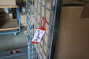 9219-00774 - Goods tag on wire mesh crate